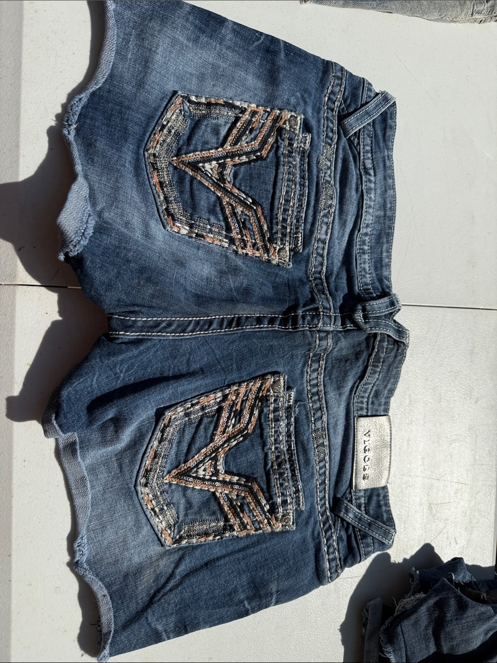 Vigoss Blue Distressed Denim Shorts with Sequin-Embellished Back Pockets
